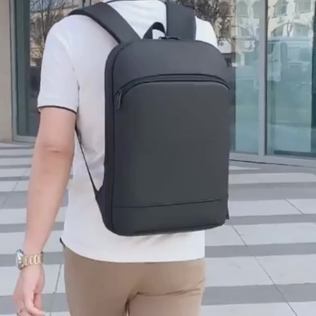 Expandable Black Nylon Business Backpack with Padded Laptop Compartment, Lightweight with Trolley Sleeve, Durable Zipper, Multi-Pocket Design, Splicing and Color Block Detail, Ideal for Daily Commute and Travel - Wet Wipe Cle