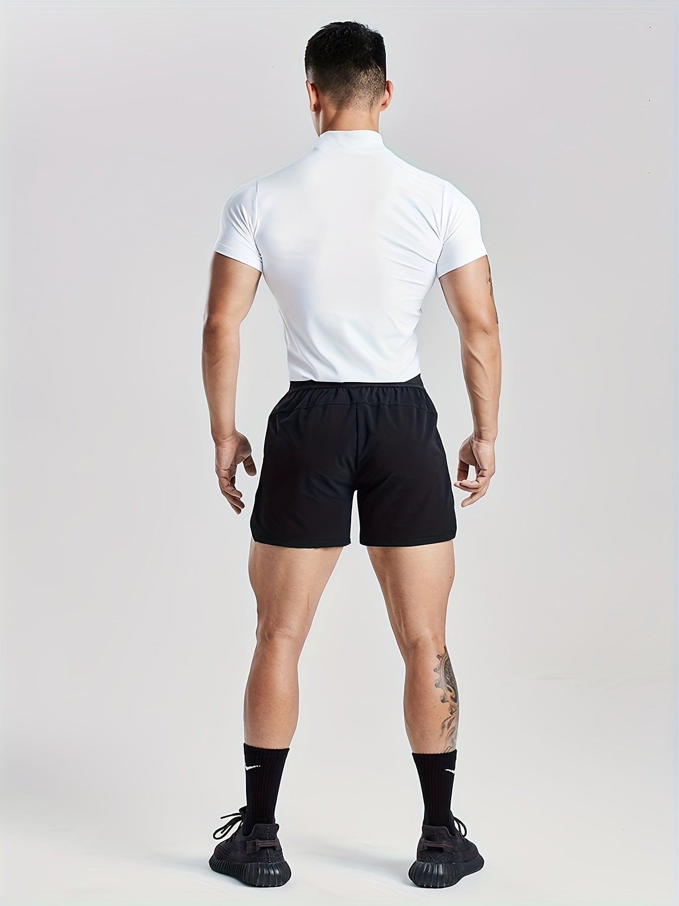 Fitness Solid Color Body Shaper Elastic Quick Dry Muscle Տղամարդկանց կարճաթև շապիկ կլոր պարանոցի մարզման կոստյում