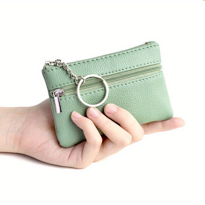A Small Wallet with a Keychain That Holds Coins in a Mini Coin Purse.
