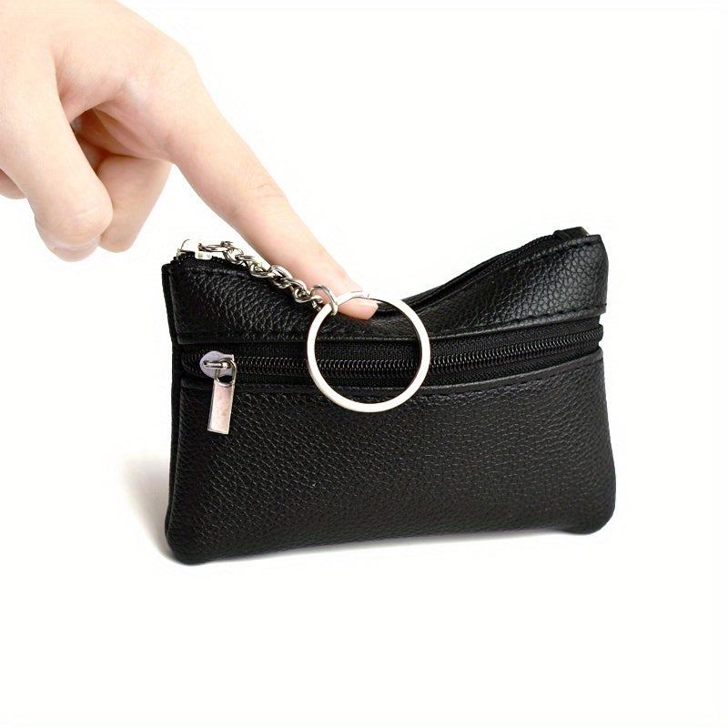 A Small Wallet with a Keychain That Holds Coins in a Mini Coin Purse.