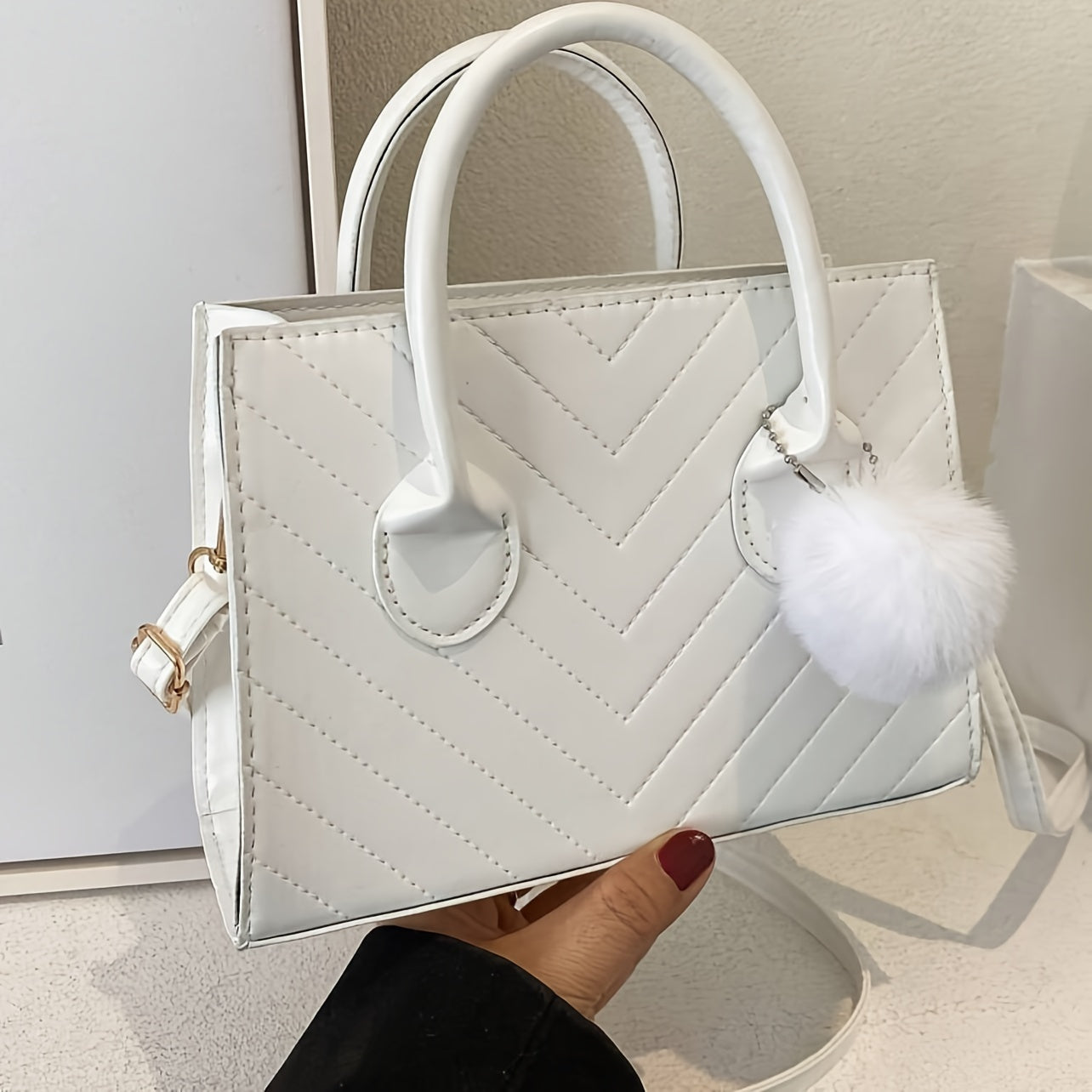 Stylish Blue Square Bag with a Chevron Design And a Bag Charm