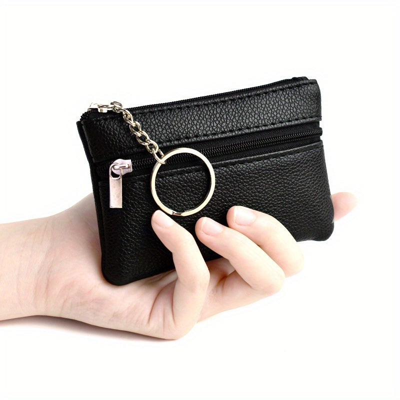 A Small Wallet with a Keychain That Holds Coins in a Mini Coin Purse.