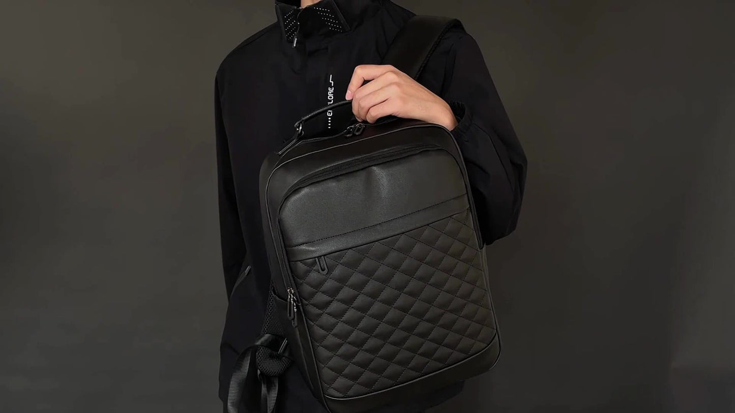 Classic -patterned business backpack, suitable for both men and women. Crafted with high-quality materials, featuring a simple yet elegant design with refined zipper details and spacious compartmentalized storage to showcase