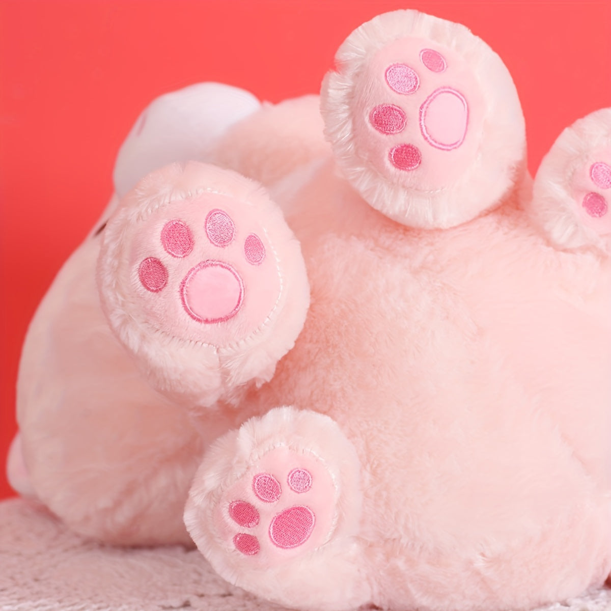 An adorable sitting New Year's cake cat plush toy doll, creative soft and cute cat pillow cat doll birthday creative gift home decoration