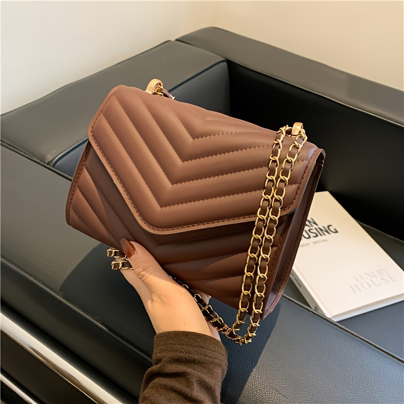 Նորաձև կանացի V-աձև կարված դիզայնով, հեշտ և թեթև միագույն փեղկով և շղթայական ուսակապի ժապավենով, հարմար է գրասենյակի, աշխատանքի, զբոսանքների համար և ոճային, որակյալ ձեռքի պայուսակ է։