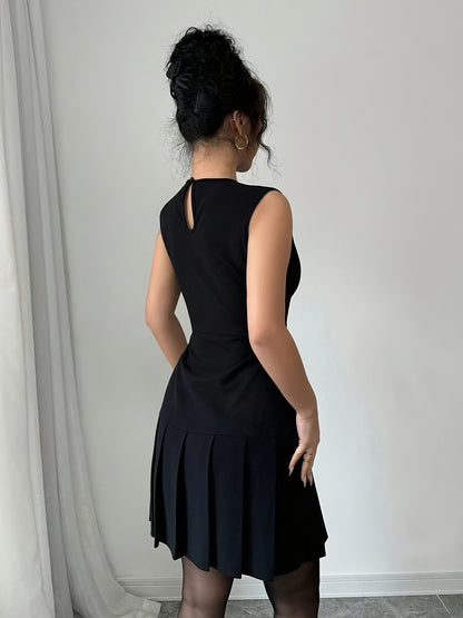 A Black Sleeveless Solid Color Ruffled Mini Dress for Women, Perfect for Birthdays, Parties, And Cocktail Events.