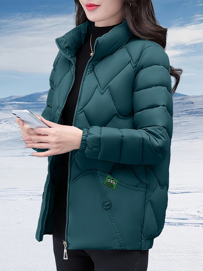 Կանացի ոճային ձմեռային վերարկու՝ սև, եղևնու ոսկեզօծ նախշով, լայնացած եզրով և H-աձև ուրվագիծով, երկար թևքերով, չձգվող գործվածքով, միայն ձեռքով լվացվող, ճապոնա-կորեական ոճով՝ առօրյա և պաշտոնական առիթների համար։