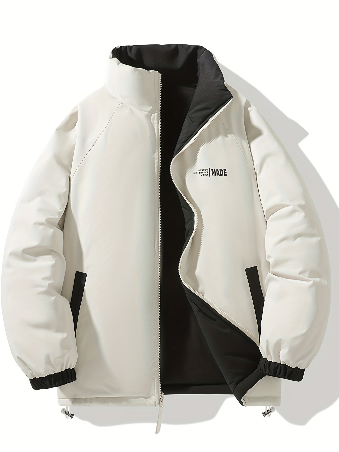 Տղամարդու երկկողմանի ձմեռային բաճկոն՝ հաստացված, կանգուն օձիքով, կայծակաճարմանդով և «MADEASURABLE» և «I CONUT» գրությամբ, սև և սպիտակ, սովորական չափսի՝ աշնանային և ձմռան համար, աշնանային վերնազգեստ, համարձակ գրություն, դիմացկուն գործվածք