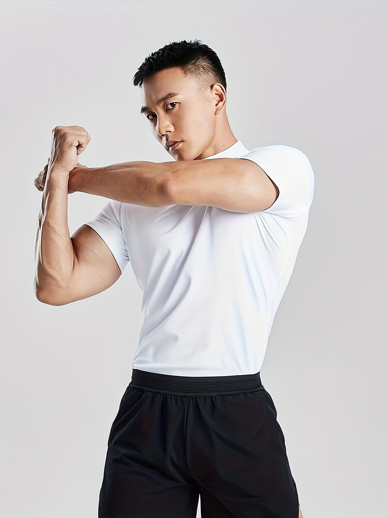 Fitness Solid Color Body Shaper Elastic Quick Dry Muscle Տղամարդկանց կարճաթև շապիկ կլոր պարանոցի մարզման կոստյում