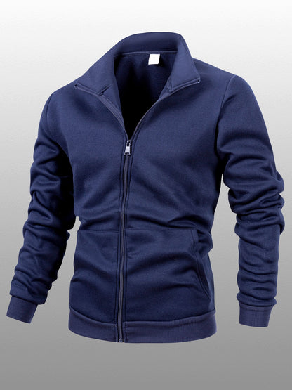 Տղամարդու միագույն բրդյա բաճկոն՝ կանգնած օձիքով, կայծակաճարմանդով, երկար թևքերով, սպորտային, առանց գլխարկի, մեծ կողային գրպաններով, հարմար է ամենօրյա կրելու, բացօթյա գործունեության, լեռնագնացության համար