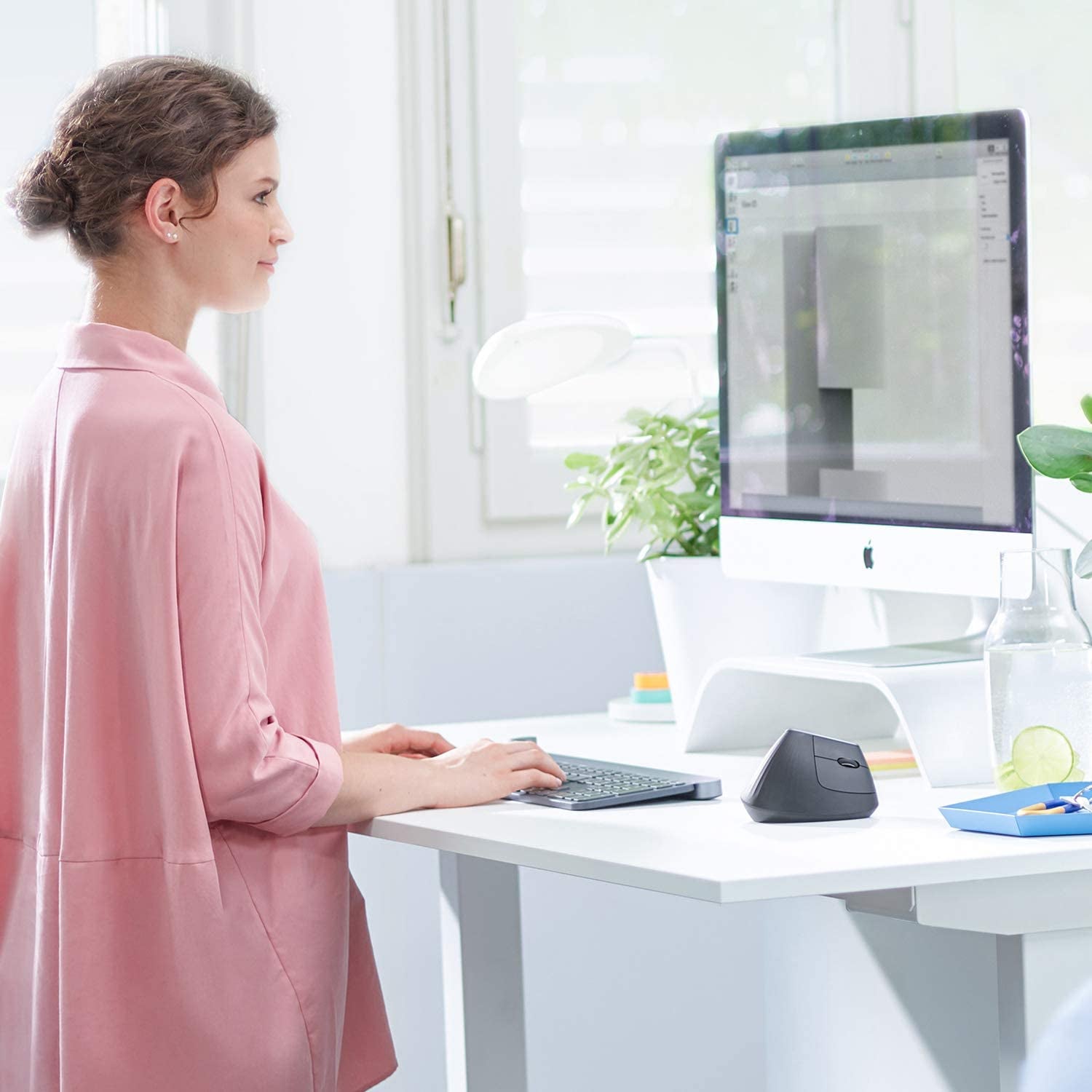 Logitech MX Vertical Wireless Mouse – Ergonomic Design Reduces Muscle Strain, Move Content between 3 Windows and Apple Computers, Rechargeable, Graphite