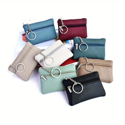 A Small Wallet with a Keychain That Holds Coins in a Mini Coin Purse.