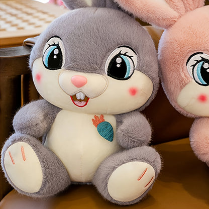 Adorable Pink Plush Bunny with Big Eyes in a Cute Sitting Pose, Featuring Gray Long Ears. A Charming Stuffed Toy Rabbit with a Carrot And Buck Teeth, Perfect for Easter Gifts And Home Decor Props, As Well As Surprise Gifts fo