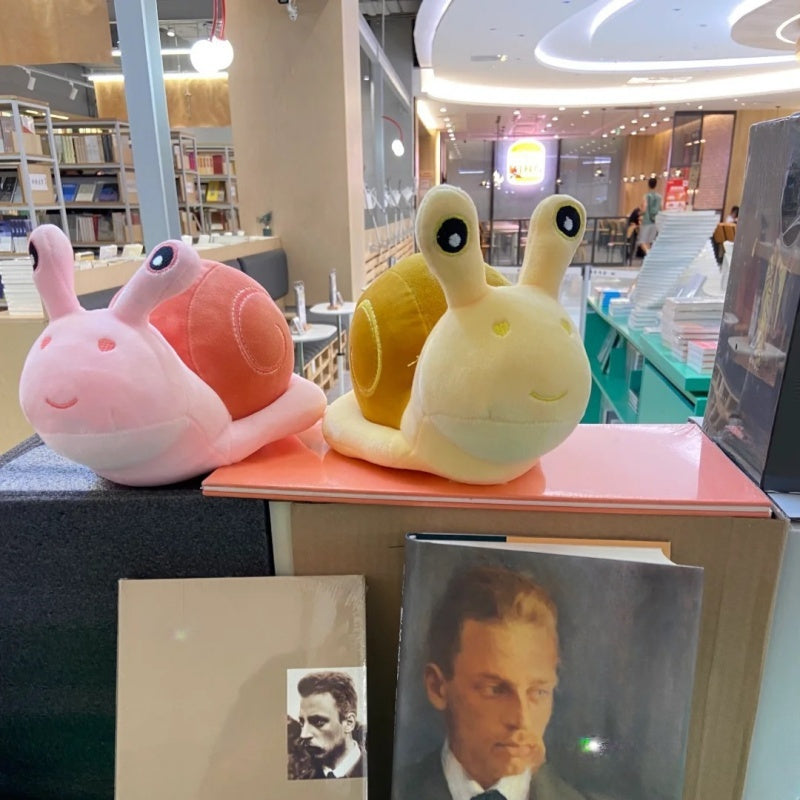 Խխունջի տեսքով փափուկ ինտերակտիվ խաղալիք ֆիգուրներ, փափուկ պոլիեսթերային խխունջի բարձ, 4 եղանակի նվեր, ծննդյան նվեր, 4 գույն (դեղին, վարդագույն), իդեալական է ամենօրյա խաղի և հարմարավետ գրկախառնությունների համար։