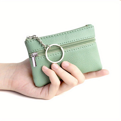 A Small Wallet with a Keychain That Holds Coins in a Mini Coin Purse.