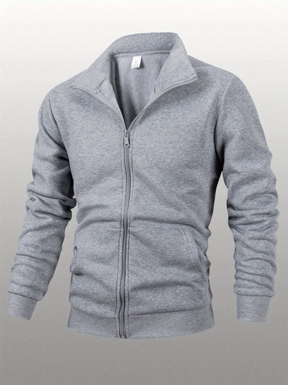 Տղամարդու միագույն բրդյա բաճկոն՝ կանգնած օձիքով, կայծակաճարմանդով, երկար թևքերով, սպորտային, առանց գլխարկի, մեծ կողային գրպաններով, հարմար է ամենօրյա կրելու, բացօթյա գործունեության, լեռնագնացության համար