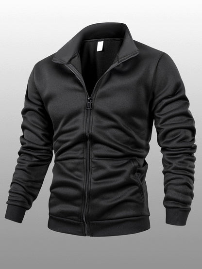 Տղամարդու միագույն բրդյա բաճկոն՝ կանգնած օձիքով, կայծակաճարմանդով, երկար թևքերով, սպորտային, առանց գլխարկի, մեծ կողային գրպաններով, հարմար է ամենօրյա կրելու, բացօթյա գործունեության, լեռնագնացության համար