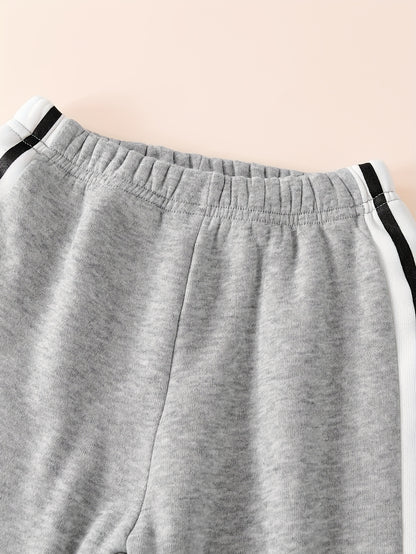 Նոր աշնանային և ձմեռային հավաքածու. դասական և ոճային կոճակներով բեյսբոլի բաճկոն՝ թևքերին տառերի նախշերով, համադրված սև և սպիտակ շերտերով տաբատի և հաստ բրդյա կտորի հետ՝ ջերմության համար: Այս հարմարավետ և բազմաֆունկցիոնալ հավաքածուն...