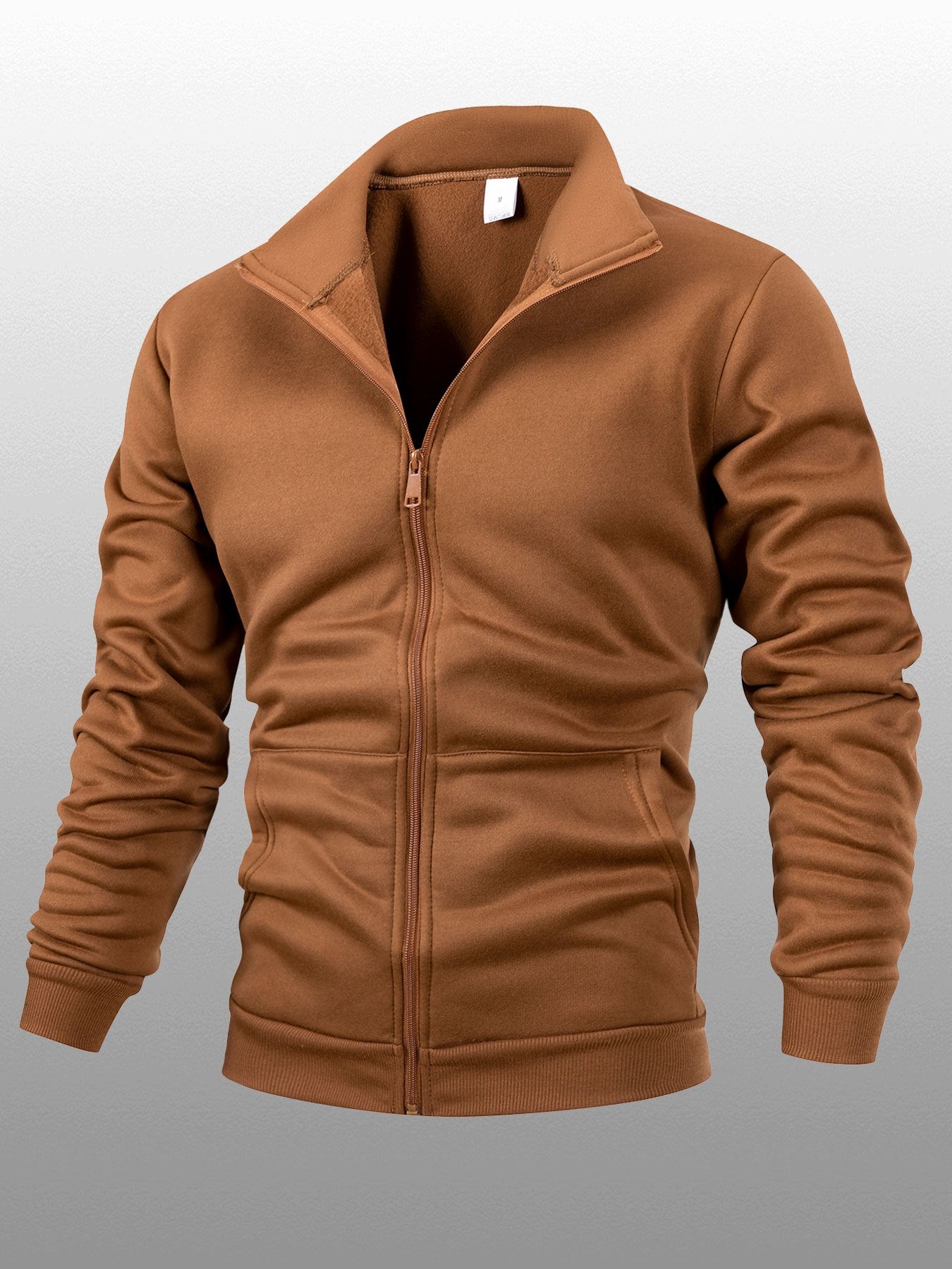 Տղամարդու միագույն բրդյա բաճկոն՝ կանգնած օձիքով, կայծակաճարմանդով, երկար թևքերով, սպորտային, առանց գլխարկի, մեծ կողային գրպաններով, հարմար է ամենօրյա կրելու, բացօթյա գործունեության, լեռնագնացության համար