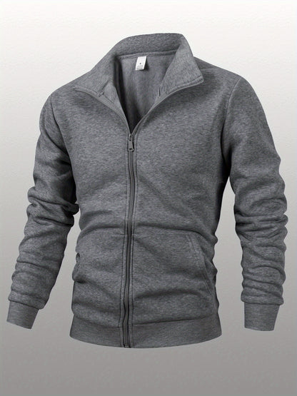 Տղամարդու միագույն բրդյա բաճկոն՝ կանգնած օձիքով, կայծակաճարմանդով, երկար թևքերով, սպորտային, առանց գլխարկի, մեծ կողային գրպաններով, հարմար է ամենօրյա կրելու, բացօթյա գործունեության, լեռնագնացության համար