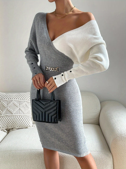 Կանացի գունավոր բլոկներով ասիմետրիկ, էլեգանտ, V-աձև դեկոլտեով, գոտկատեղի շղթայով զարդարված, կոնքերը ընդգծող սեքսուալ գործվածքից միդի զգեստ