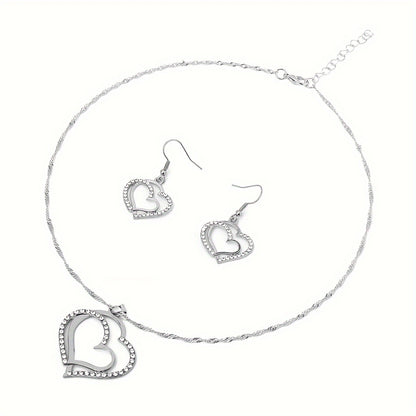 A Creative And Unique Jewelry Set Consisting Of 1 Pair Of Earrings And 1 Necklace, Featuring A Sparkling Heart-shaped Design With Shiny Rhinestones, Perfect For Accessorizing Daily Outfits Or Party Wear.