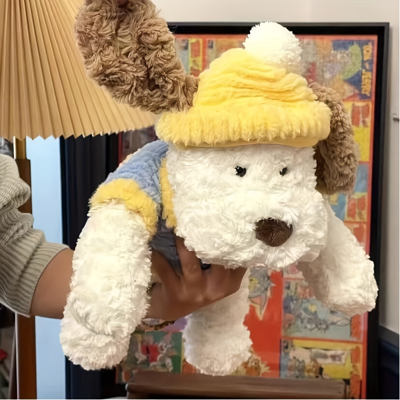 Սիրուն փափուկ խաղալիք շան տեսքով, իդեալական է գրկախառնվելու համար։ Այս փափուկ խաղալիք կենդանին ծառայում է որպես դեկորատիվ բարձ և հիանալի ընկերակից է։ Հիանալի է որպես նվեր ծննդյան և տոների համար սիրելիների համար։