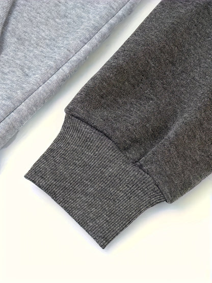 Տղամարդու ոճային գունային բլոկներով վերնաշապիկ՝ առօրյա, կայծակաճարմանդով և գլխարկով սվիտեր՝ առջևի գրպաններով, երկար թևքերով և երիզներով՝ շագանակագույն և սև դիզայնով, հարմարավետ աշնանային և ձմեռային հագուստի համար։