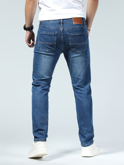 Premium Casual Men'S Jeans with a Slim Fit, Suitable for Light Business Wear, Featuring Stretchy Fabric And a Stylish Blue Wash.
