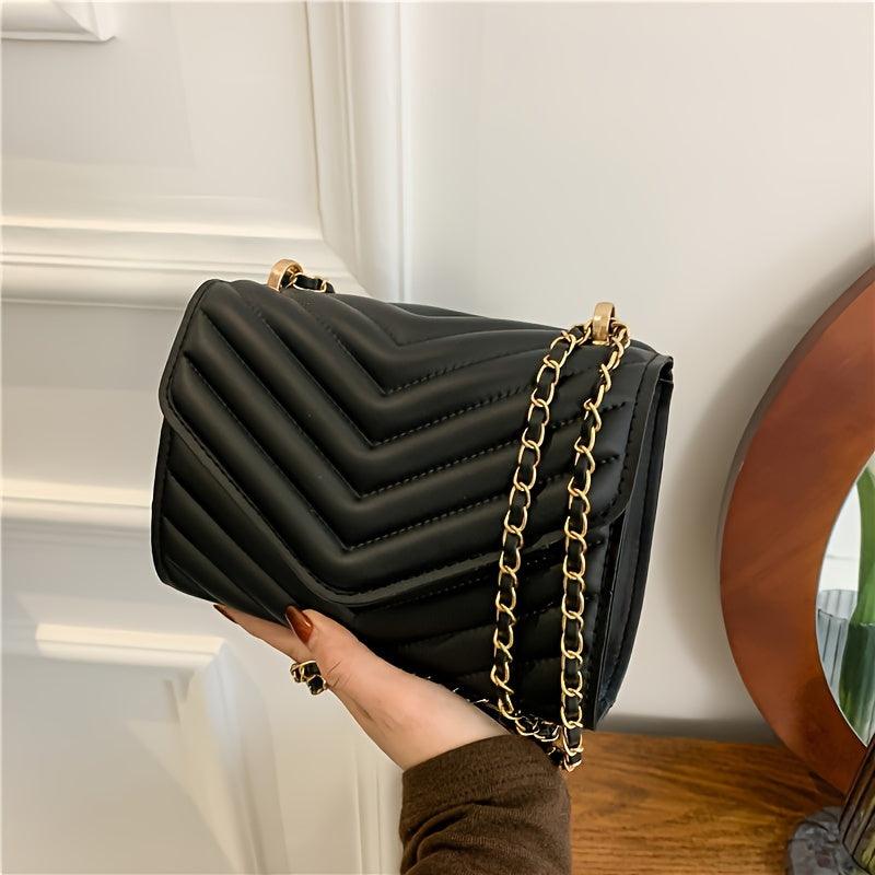 Նորաձև կանացի V-աձև կարված դիզայնով, հեշտ և թեթև միագույն փեղկով և շղթայական ուսակապի ժապավենով, հարմար է գրասենյակի, աշխատանքի, զբոսանքների համար և ոճային, որակյալ ձեռքի պայուսակ է։