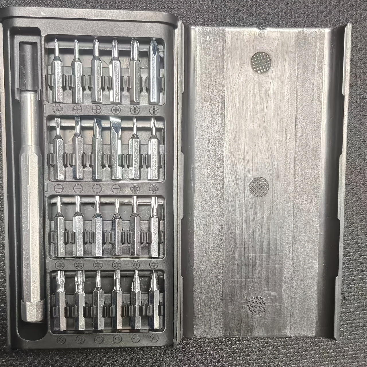 25-In-1 Precision Screwdriver Set for Mobile Phone And Tablet Repairs, Includes Drill Bits, Tweezers, And Pry Tools, Comes with a Portable Storage Case, Essential for Electronic Device Maintenance.