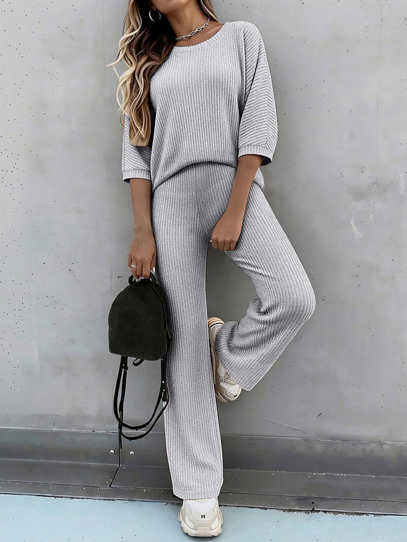 A Two-Piece Set Featuring a Solid Color Batwing Short-Sleeve T-Shirt with a Round Neck And Casual Wide-Leg Stretchy Pants - ayq