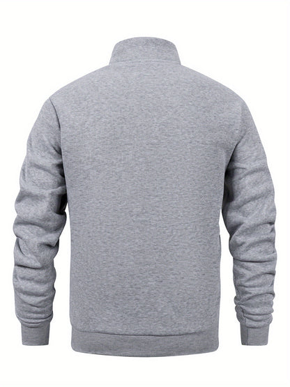 Տղամարդու միագույն բրդյա բաճկոն՝ կանգնած օձիքով, կայծակաճարմանդով, երկար թևքերով, սպորտային, առանց գլխարկի, մեծ կողային գրպաններով, հարմար է ամենօրյա կրելու, բացօթյա գործունեության, լեռնագնացության համար