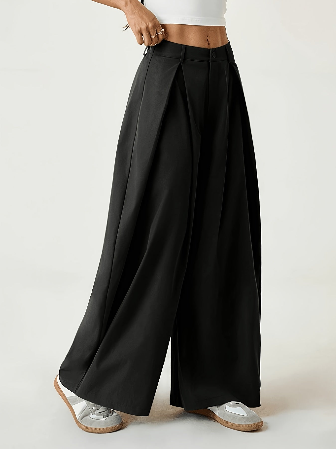 Elegant Wide-Leg Trousers with Curved Hem and Smock Detail