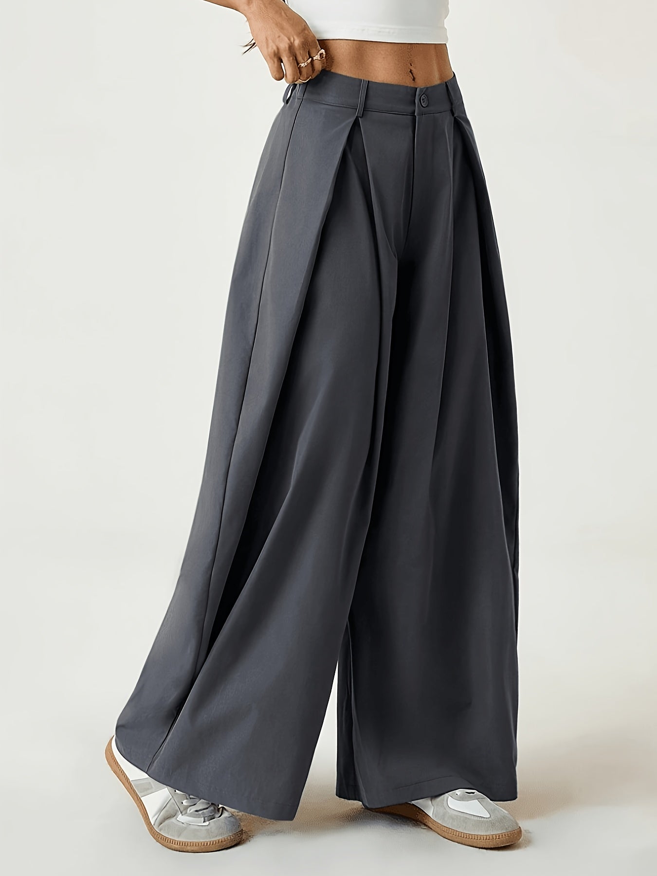 Elegant Wide-Leg Trousers with Curved Hem and Smock Detail